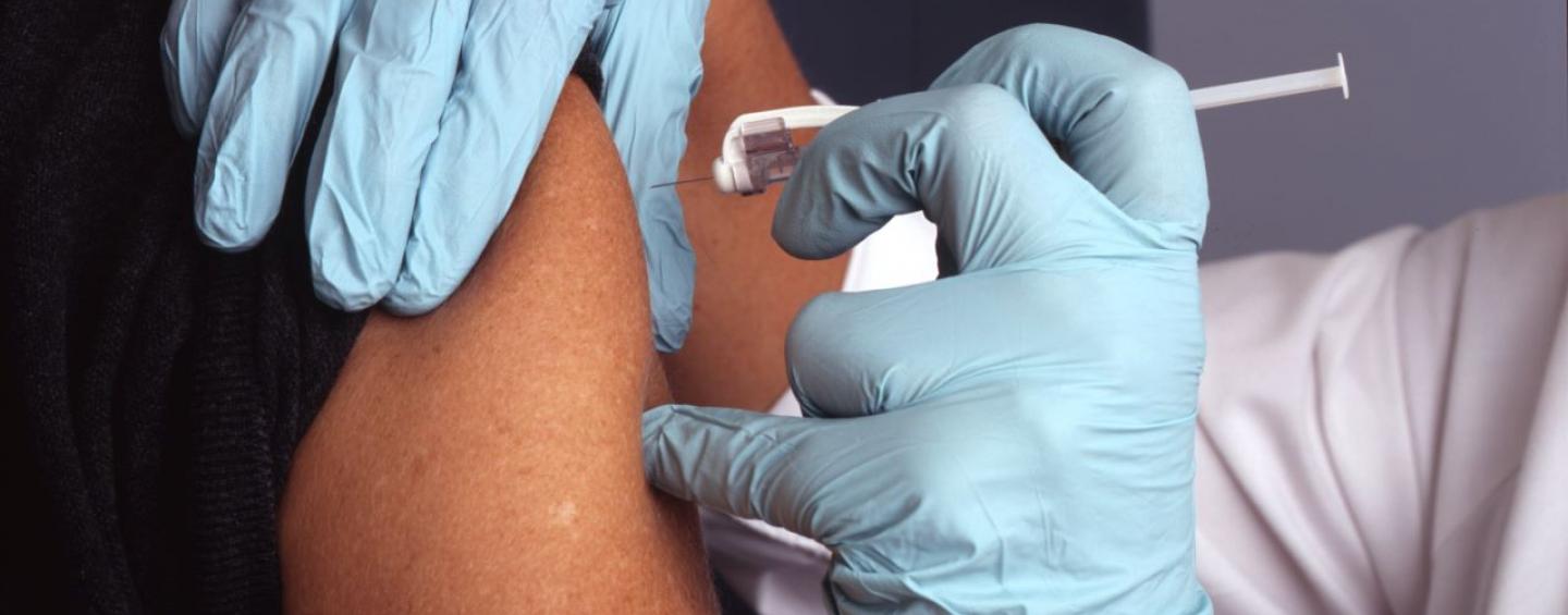 A person recieving a vaccine