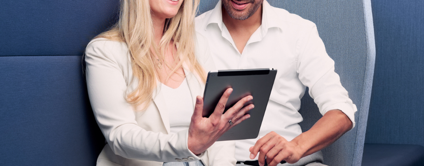 Couple watching webinar